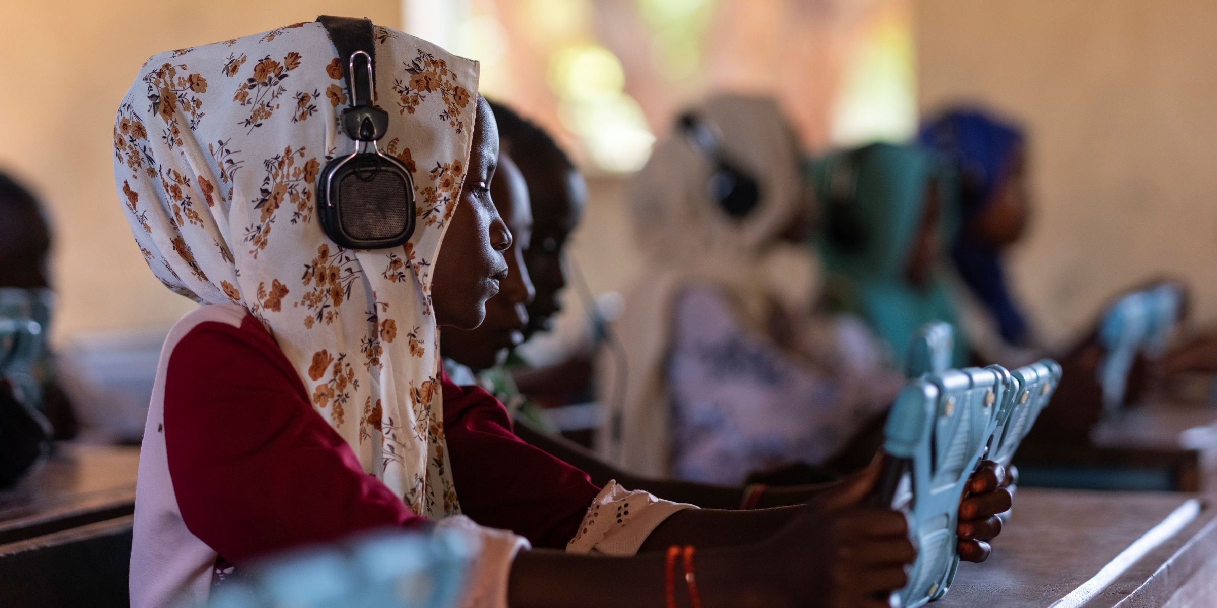 Student Samira Yaya studies on a tablet, part of an EdTech program developed by WarChild Holland named ‘Can’t Wait to Learn’, at a school in Djabel Refugee Camp, Eastern Chad. Credit: GPE/Michael Knief/AP